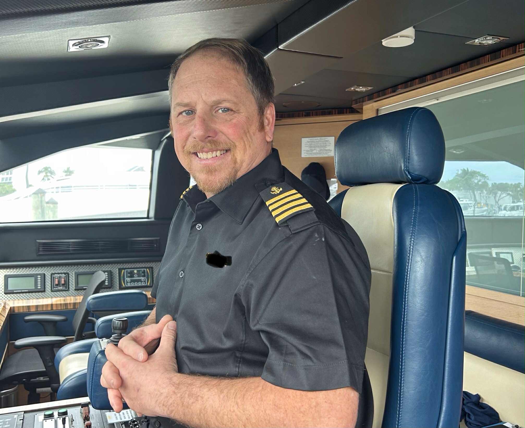 Captain at the helm of F/V Heidi Lyn